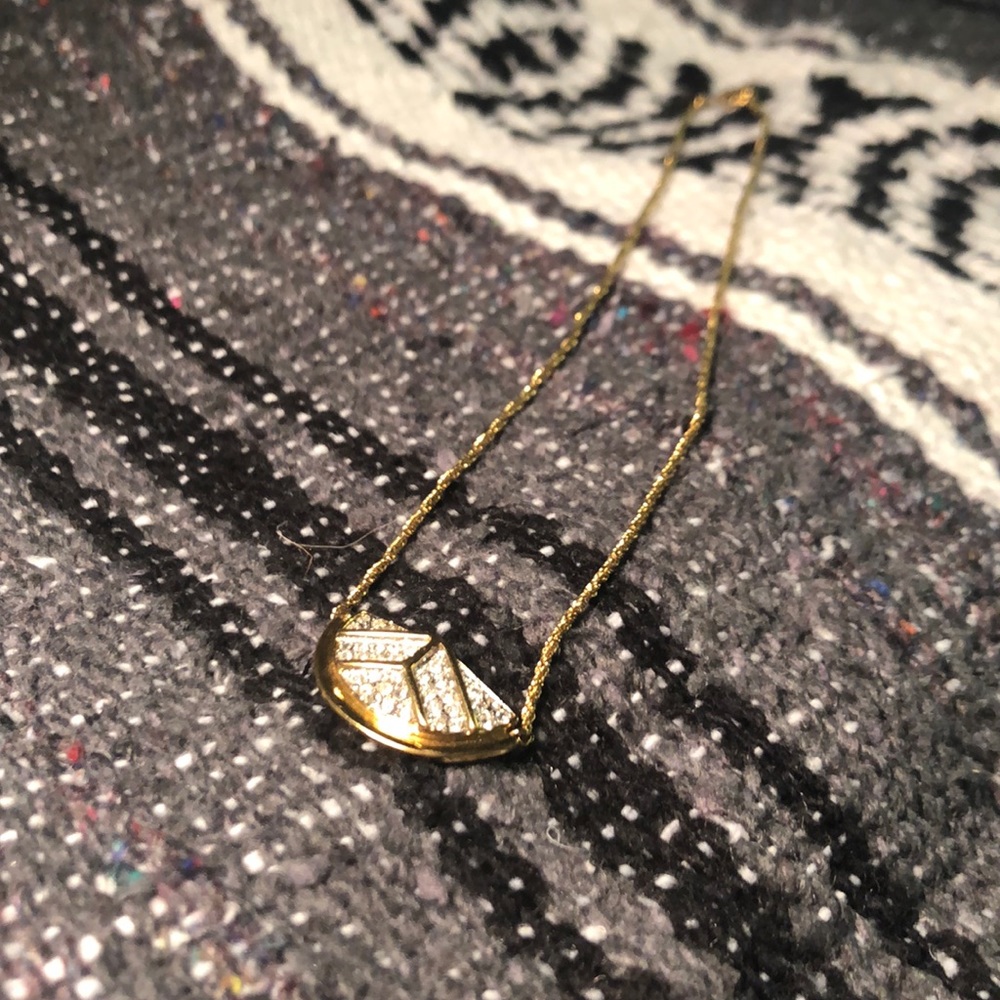 Gold Necklace with a Half-Oval Penchant